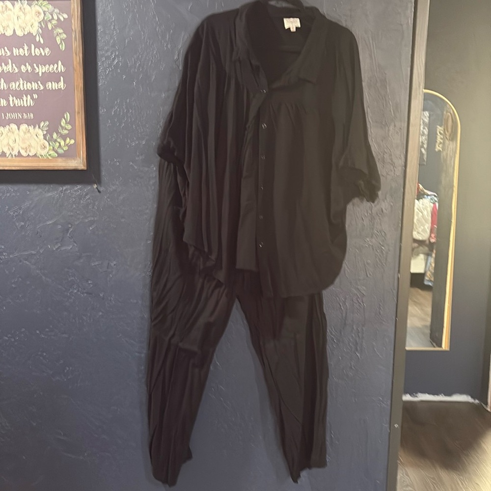 Black linen button up shirt with pants.